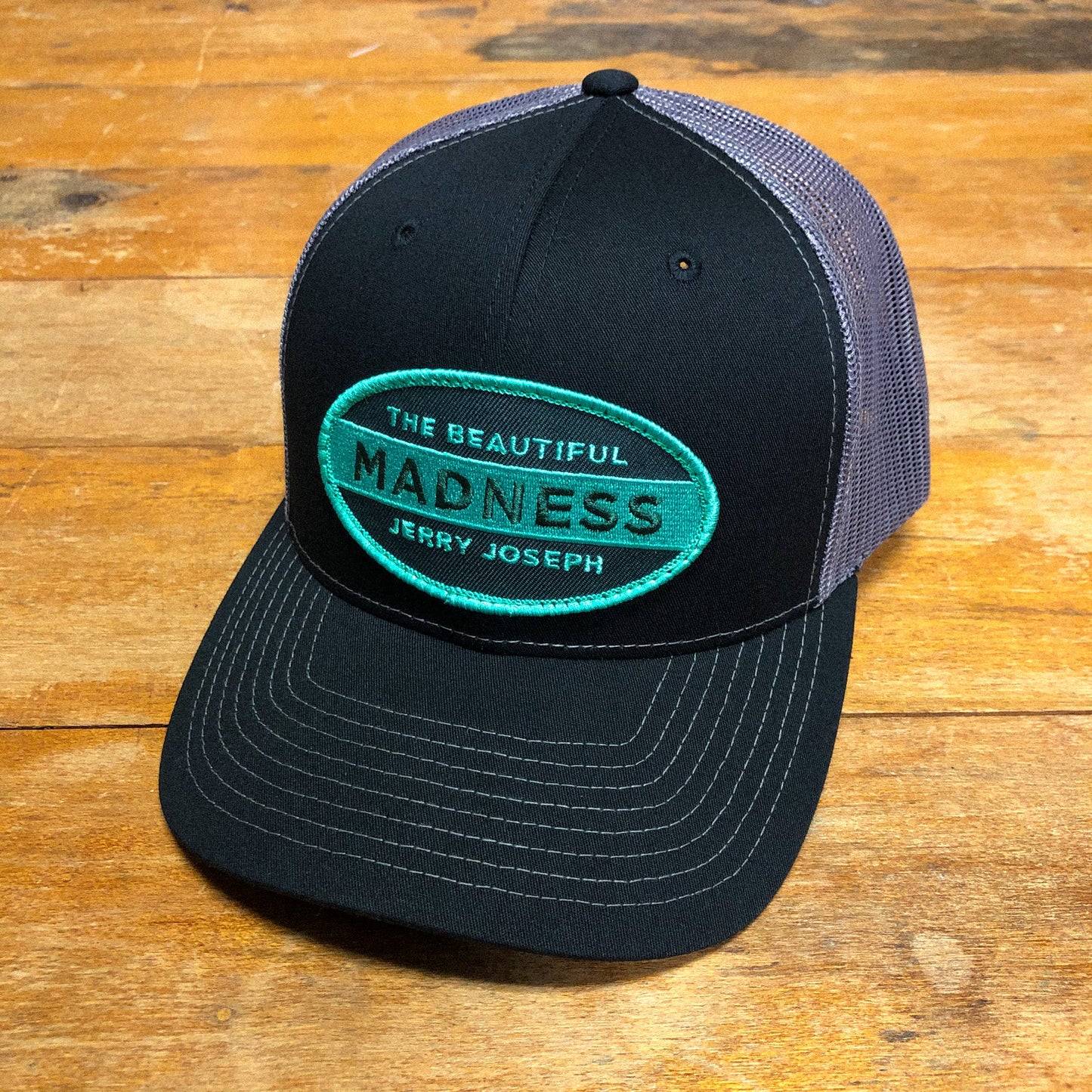 The Beautiful Madness Trucker Hat – Black
